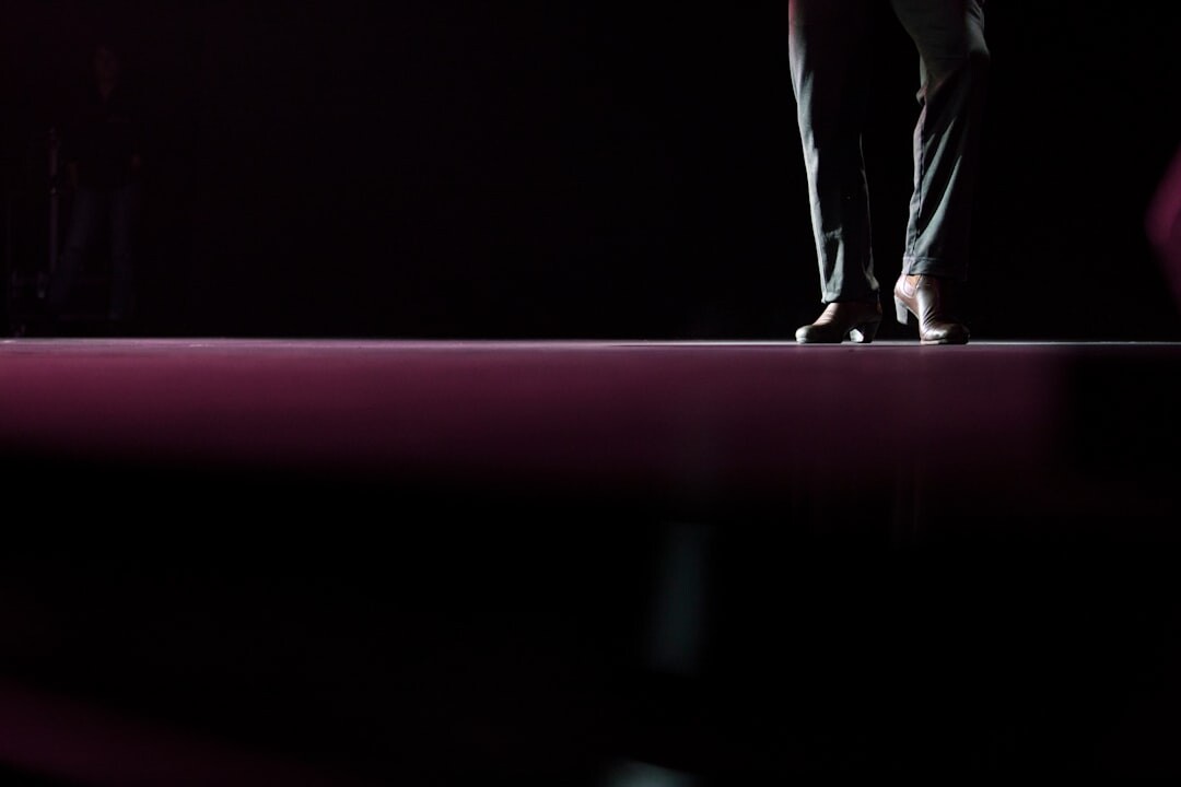 Fashion runway show with dramatic lighting