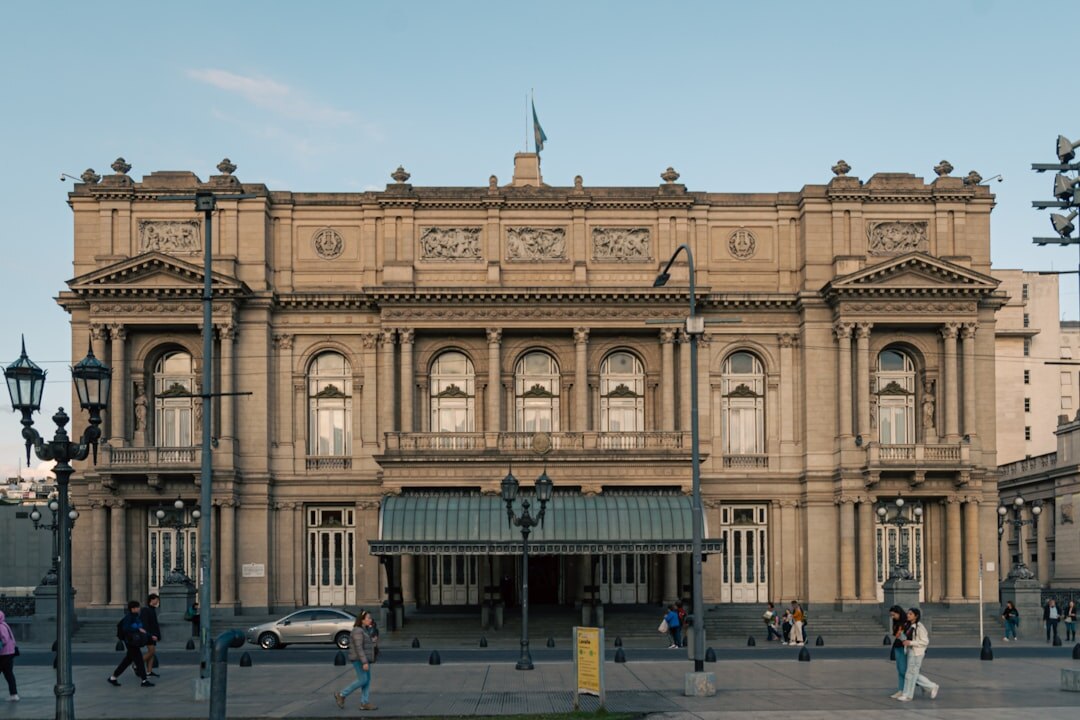 Grand neoclassical theater facade in Buenos Aires during daytime